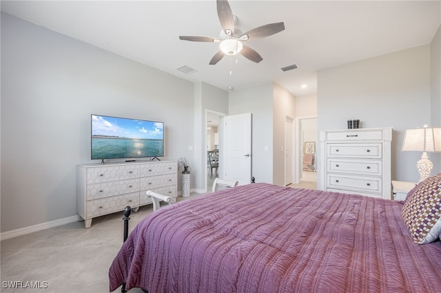 bedroom with light tile patterned floors and ceiling fan