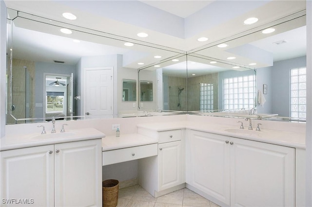 ensuite bathroom featuring recessed lighting, visible vents, a stall shower, connected bathroom, and vanity