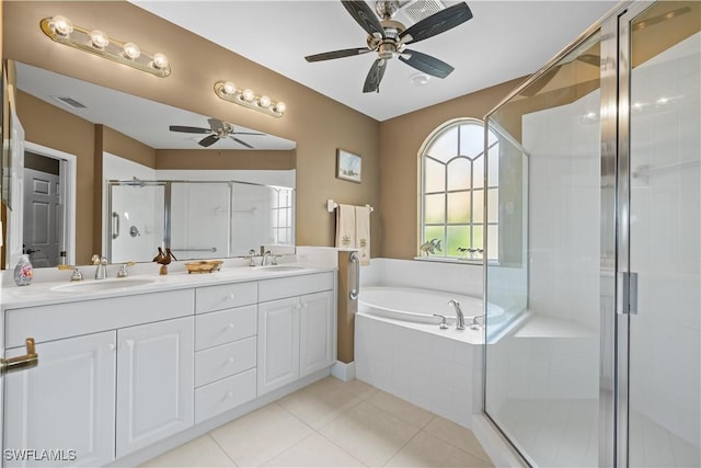 bathroom with plus walk in shower, vanity, tile patterned floors, and ceiling fan