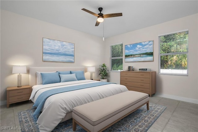 bedroom with light tile patterned floors and ceiling fan