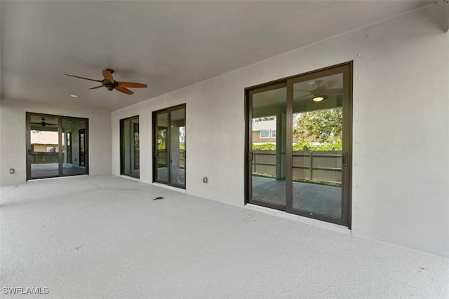 view of patio / terrace featuring ceiling fan