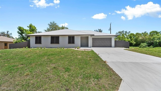 single story home with a garage, driveway, a front lawn, and fence