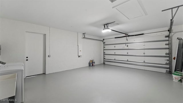 garage featuring independent washer and dryer