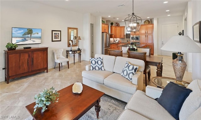 living room featuring an inviting chandelier