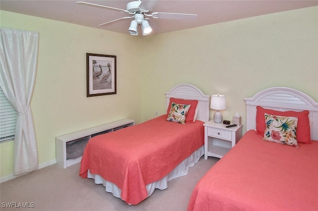 bedroom featuring ceiling fan and carpet floors