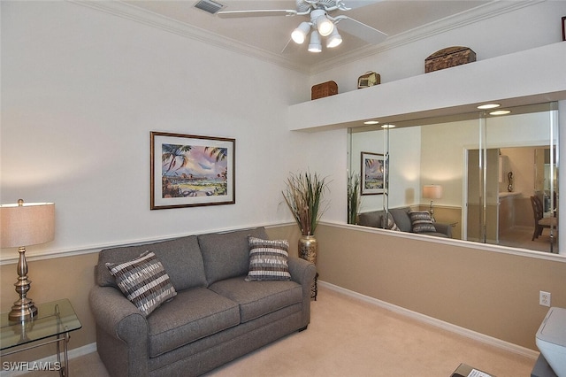 living room featuring carpet, ceiling fan, and ornamental molding