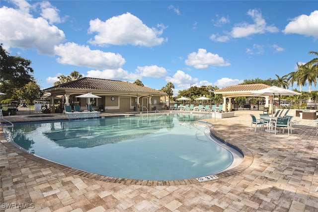 view of pool with a gazebo and a patio