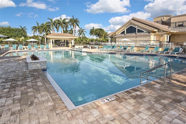 view of pool with a gazebo and a patio