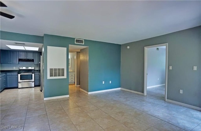 unfurnished living room with light tile patterned flooring