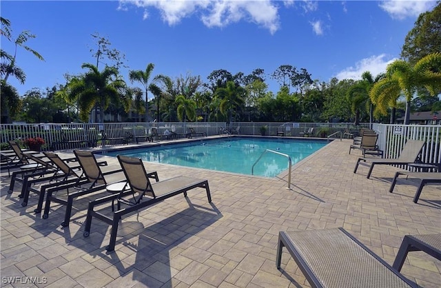 view of pool featuring a patio