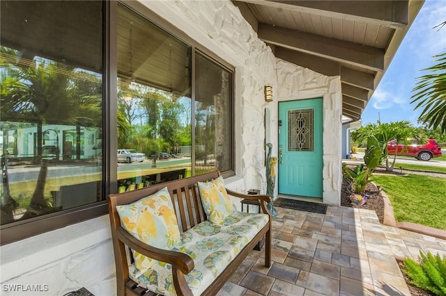 entrance to property with a porch