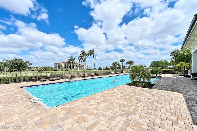 view of swimming pool featuring a patio area