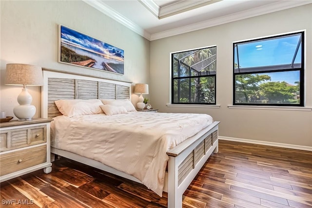 bedroom with crown molding and dark wood-type flooring