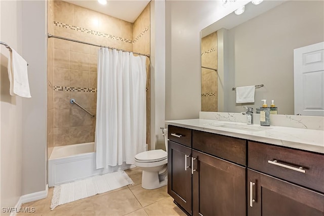 full bathroom with tile patterned floors, shower / tub combo with curtain, vanity, and toilet