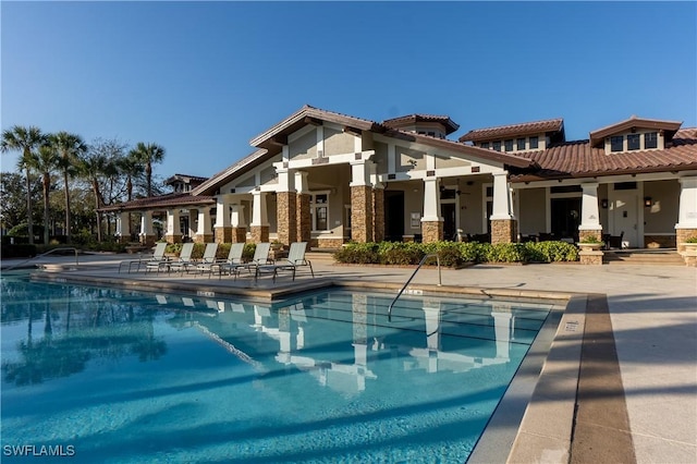 view of swimming pool with a patio area