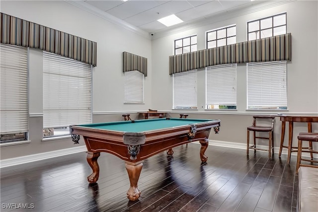 playroom featuring dark hardwood / wood-style flooring, crown molding, and billiards