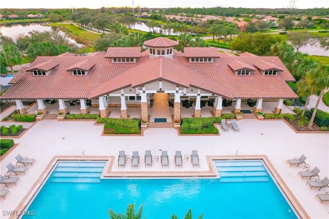 view of pool with a water view