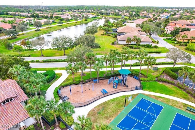 drone / aerial view featuring a water view