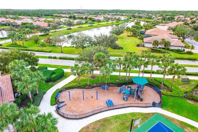 bird's eye view with a water view