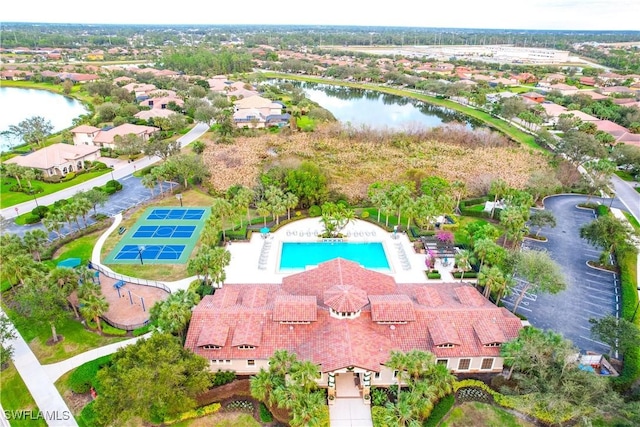 drone / aerial view with a water view