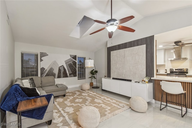 living room featuring vaulted ceiling with skylight