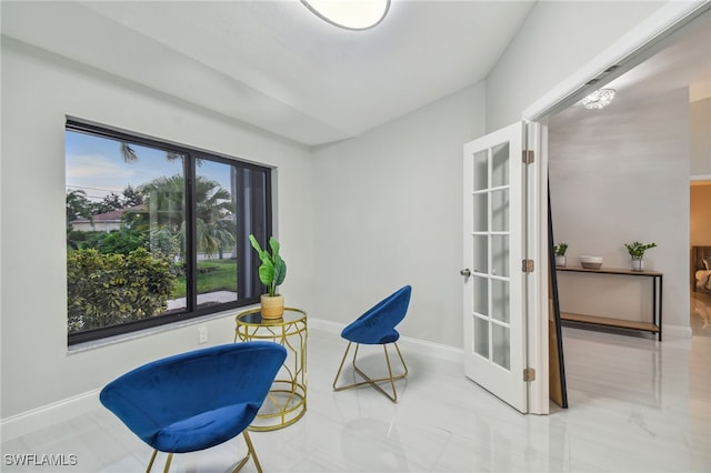 living area with a wealth of natural light and french doors