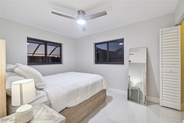 bedroom featuring ceiling fan