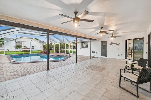 view of pool featuring ceiling fan