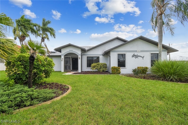 single story home with a front lawn