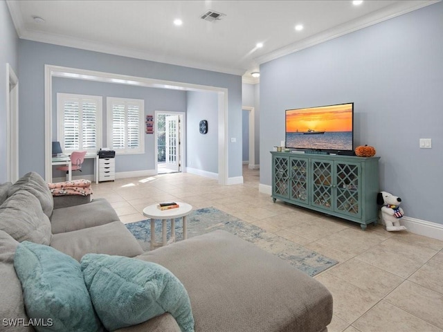 living room featuring ornamental molding and light tile patterned flooring