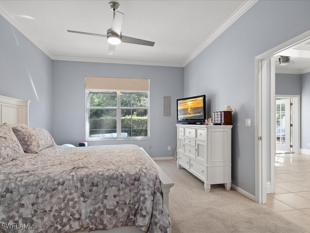 bedroom featuring crown molding, light carpet, and ceiling fan