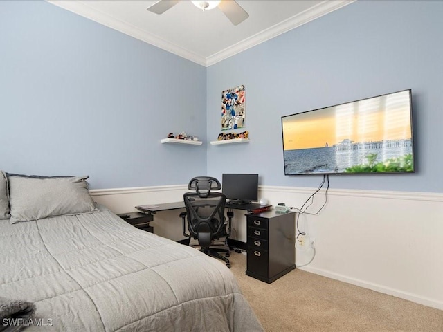 bedroom featuring crown molding, light carpet, and ceiling fan