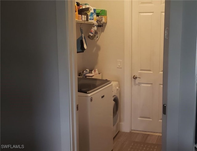 laundry area featuring washing machine and dryer