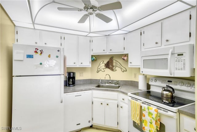 kitchen with white cabinets, white appliances, ceiling fan, and sink