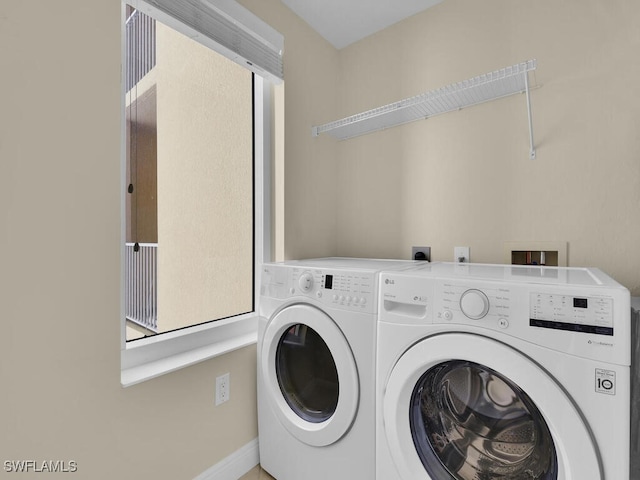 laundry area featuring washer and dryer