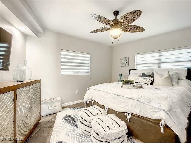 309 Donora Blvd, Fort Myers Beach, FL 33931 - bedroom with a ceiling fan and baseboards