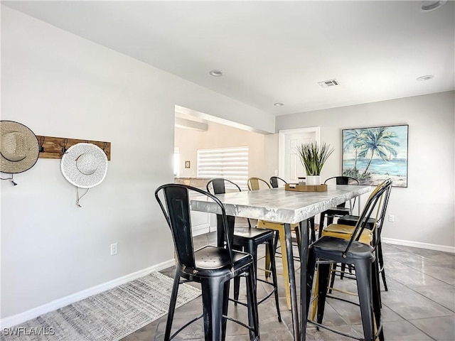 309 Donora Blvd, Fort Myers Beach, FL 33931 - dining room with visible vents and baseboards