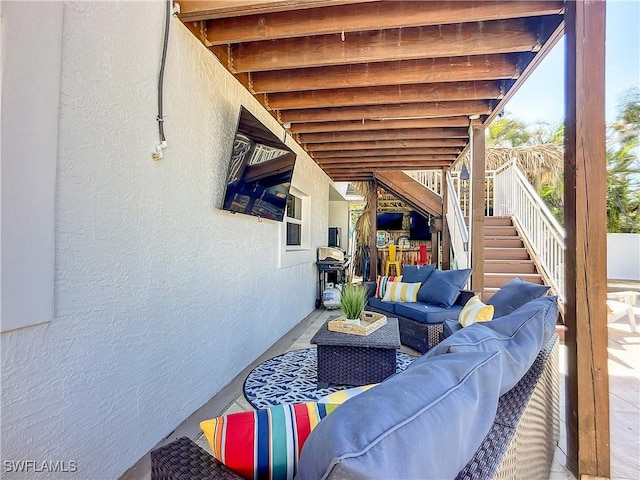 309 Donora Blvd, Fort Myers Beach, FL 33931 - view of patio / terrace featuring stairway and an outdoor living space