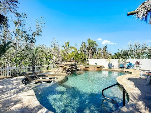 309 Donora Blvd, Fort Myers Beach, FL 33931 - view of swimming pool with a patio, a fenced backyard, and a fenced in pool