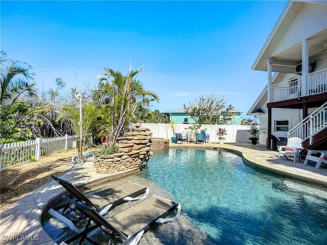 309 Donora Blvd, Fort Myers Beach, FL 33931 - view of swimming pool with a patio area, a fenced backyard, and a fenced in pool