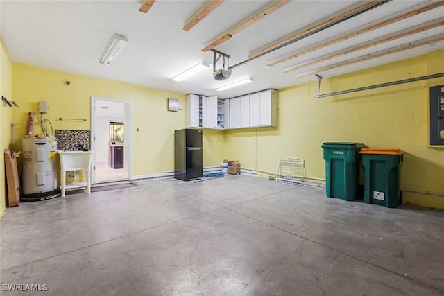 garage with a sink, water heater, freestanding refrigerator, a garage door opener, and electric panel