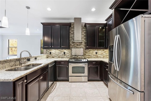 kitchen featuring light tile patterned floors, stainless steel appliances, a sink, wall chimney range hood, and a peninsula