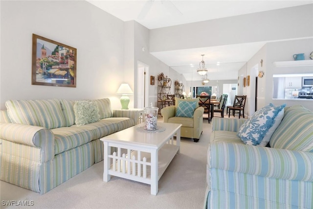 living room featuring light carpet