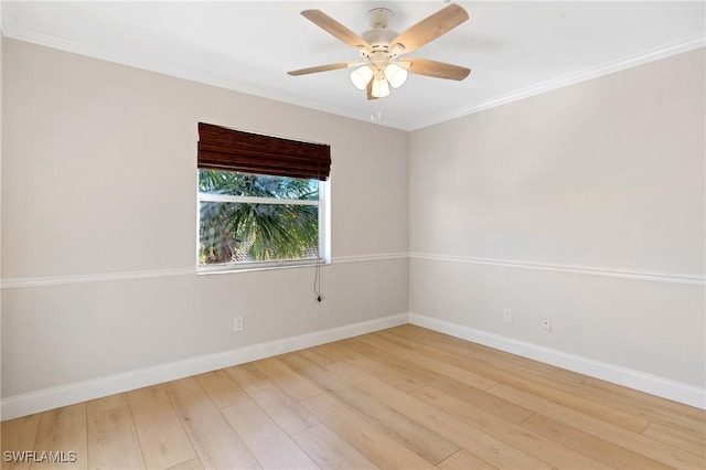 unfurnished room with ceiling fan, ornamental molding, and hardwood / wood-style flooring