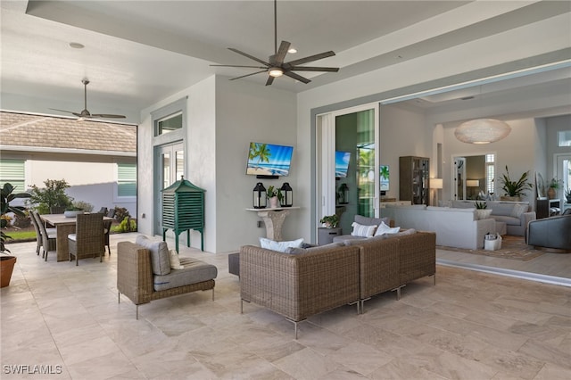 living room featuring ceiling fan