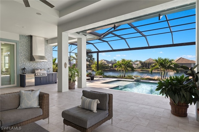 view of swimming pool with area for grilling, a water view, glass enclosure, grilling area, and a patio