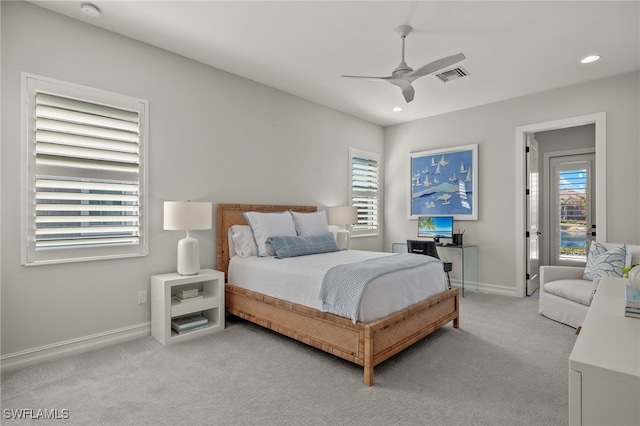 carpeted bedroom with ceiling fan