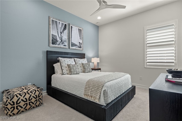 carpeted bedroom featuring ceiling fan