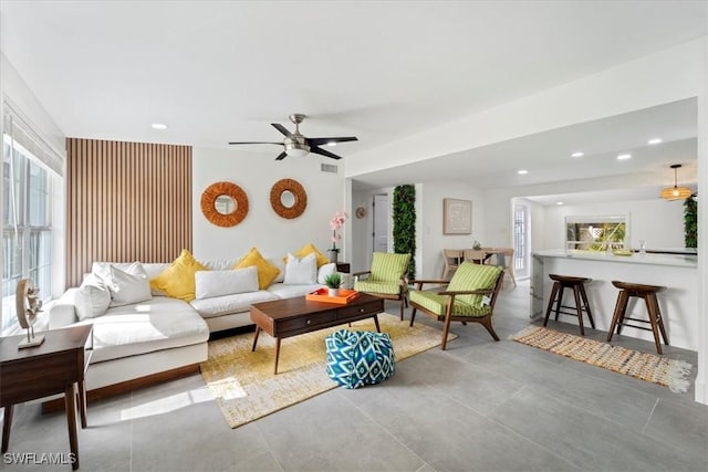 living room featuring ceiling fan