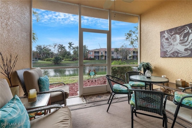 sunroom with a water view